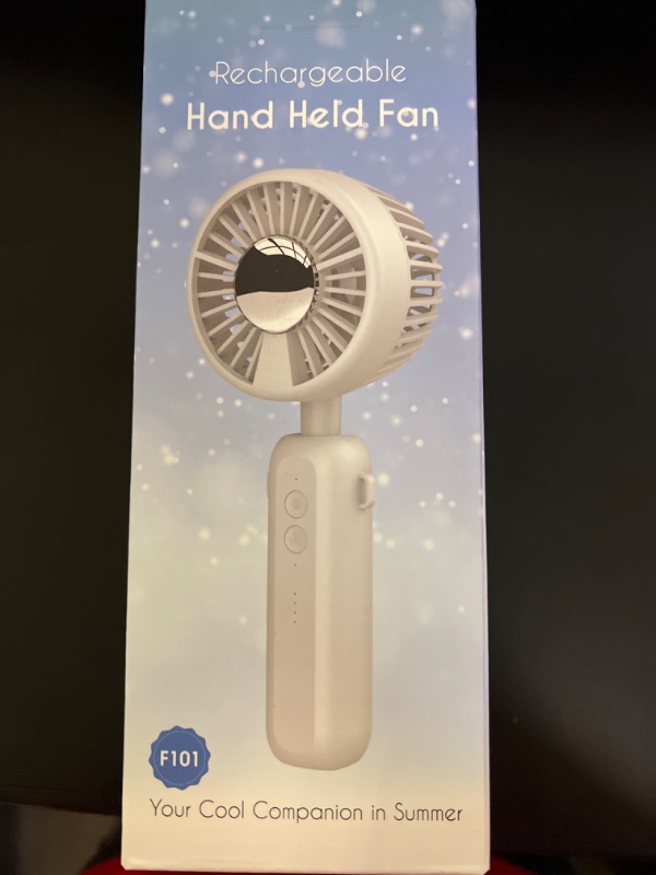 Photo 1 of Rhythm Air Portable Handheld Fan. Dual Blade TECHNOLOGY gives a strong focused, column of Air. 4-speed, feel 8-12 ft away. Rear blades pull in. Front blades direct, USB TYPE-C, anywhere you need Air