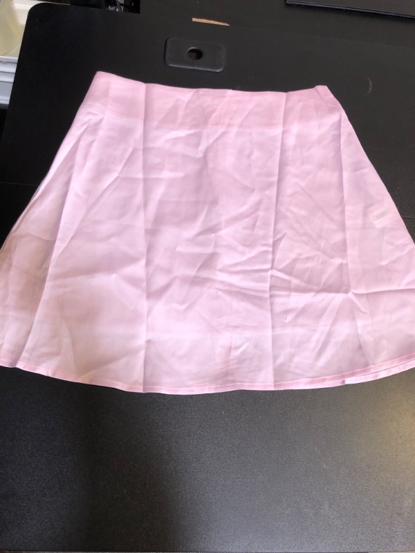 Photo 1 of WOMENS SKIRT SIZE SMALL 
PINK 
