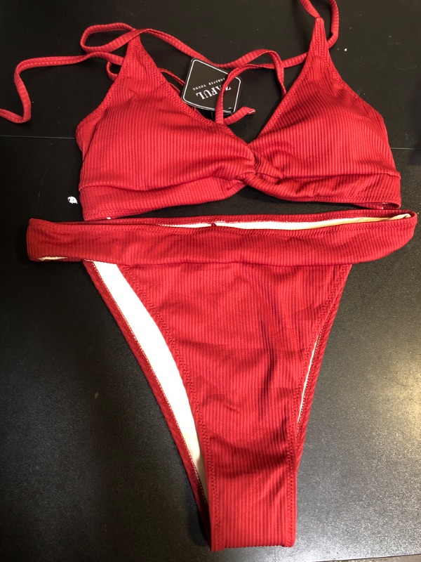 Photo 1 of WOMENS TWO PIECE SWIMSUIT SET
SIZE LARGE 
