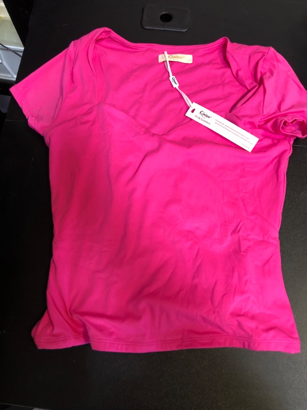 Photo 1 of WOMENS TOP SIZE LARGE (PINK)