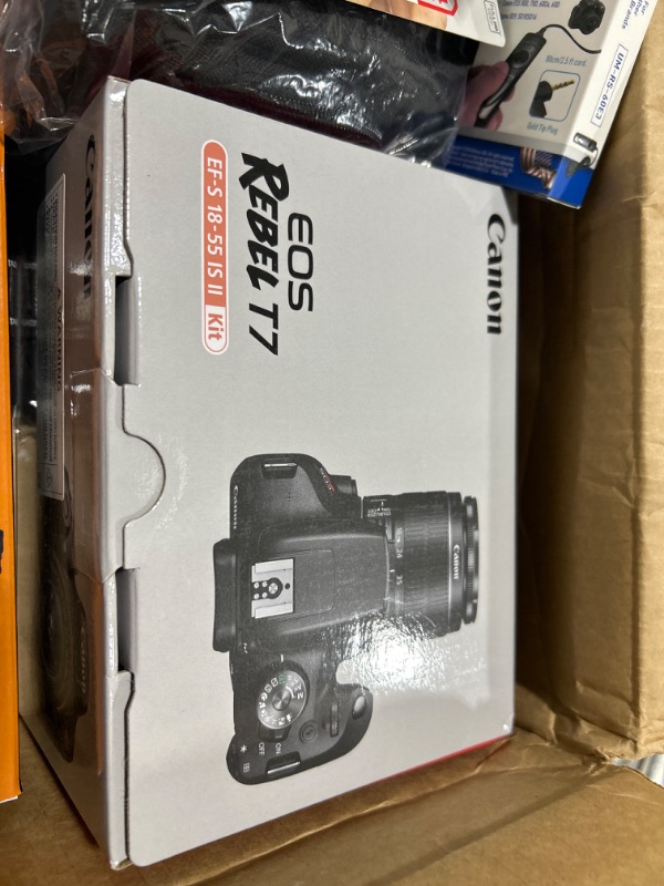 Photo 1 of Canon EOS Rebel T7 DSLR Camera Bundle w/ Canon EF-S 18-55mm f/3.5-5.6 is II Lens + 2pc SanDisk 64GB Memory Cards, Wide Angle Lens, Telephoto Lens, 3pc Filter Kit + Accessory Kit