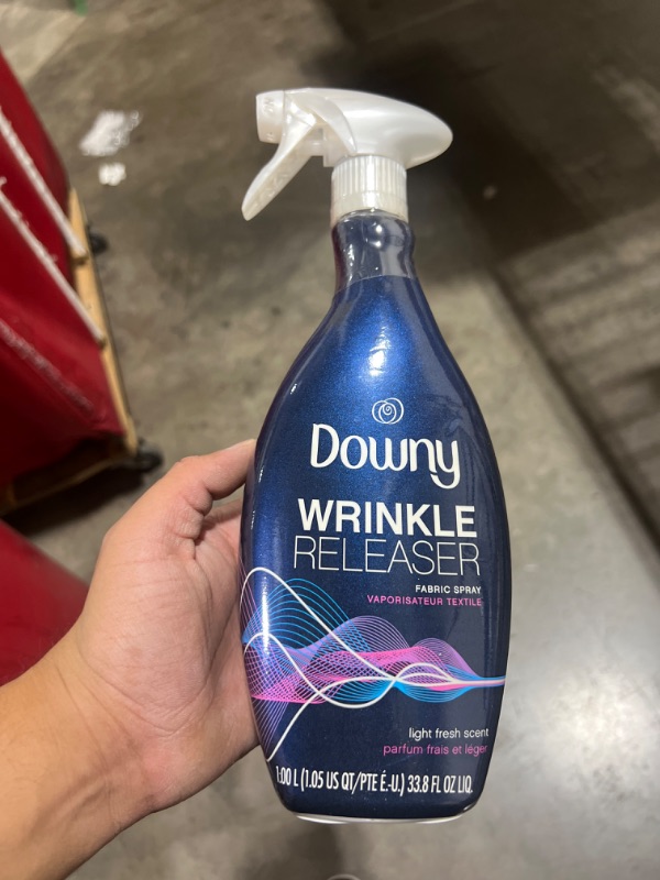 Photo 2 of Downy Wrinkle Releaser Fabric Refresher Spray, Odor Eliminator, Ironing Aid and Anti Static Spray, Light Fresh Scent, 33.8 Fl Oz Light Fresh Scent 33.8 Fl Oz (Pack of 1)