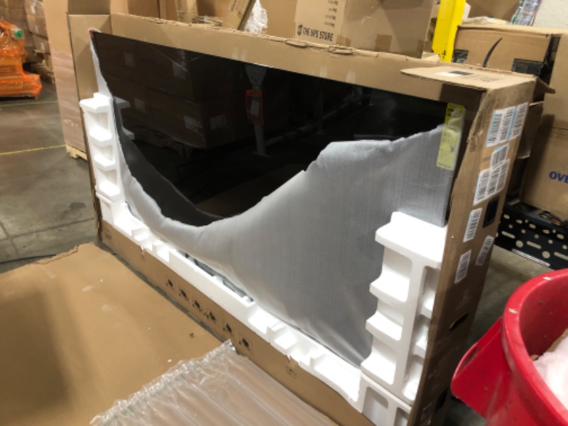 Photo 3 of **PARTS ONLY. SCREEN CRACKED. BOX DAMAGED** Samsung - 83” Class S90C OLED Smart  TV **PARTS ONLY**
