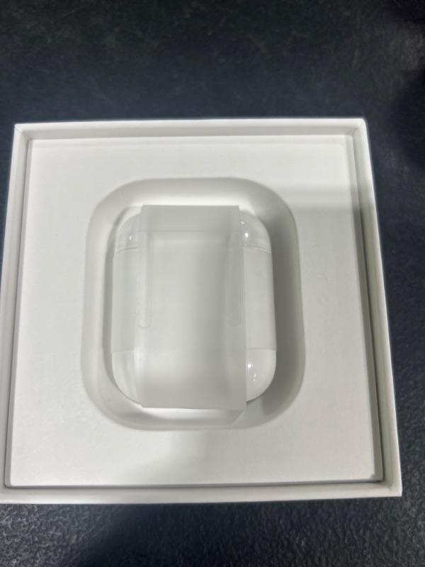 Photo 2 of Apple AirPods (2nd Generation) Wireless Ear Buds, Bluetooth Headphones with Lightning Charging Case Included, Over 24 Hours of Battery Life, Effortless Setup for iPhone Without AppleCare+