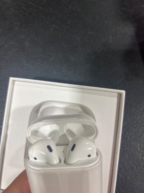 Photo 3 of Apple AirPods (2nd Generation) Wireless Ear Buds, Bluetooth Headphones with Lightning Charging Case Included, Over 24 Hours of Battery Life, Effortless Setup for iPhone Without AppleCare+