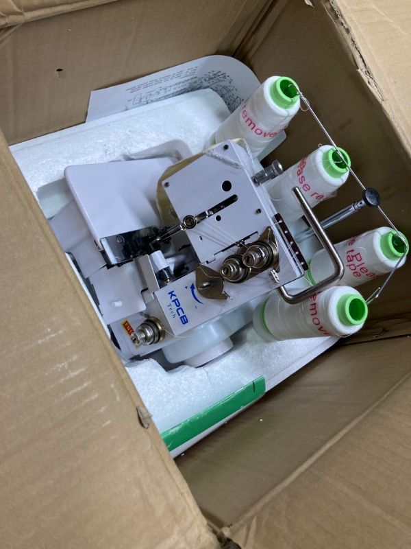 Photo 3 of ****USED**THREAD HOLDER IS BROKEN***FOR PARTS ONLY***SOLD AS IS NO RETURNS***ALL SALES ARE FINAL** KPCB SERGER SEWING MACHINE WITH UPGRADED LED LIGHT AND ACCESSORIES KIT, HEAVY-DUTY DURABLE METAL FRAME OVERLOCK MACHINES
