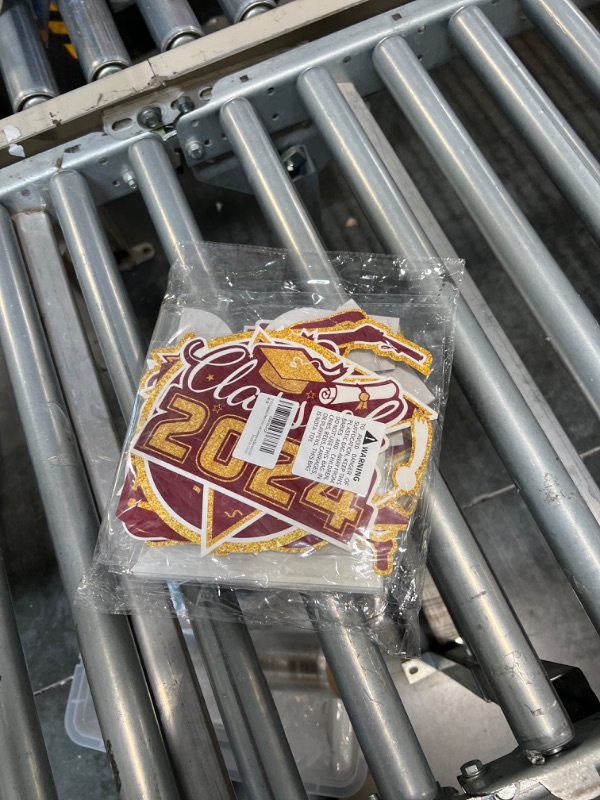 Photo 1 of 21 Pieces 2024 Graduation Decorations Set includes Congrats Grad Banner, Honeycomb Centerpieces, Hanging Swirl Kit for High School & College Celebrations Maroon and Gold Themed Party Supplies