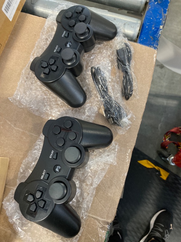 Photo 2 of *** NOT FUNCTIONAL SELLING AS PARTS NO RETURNS****
OKHAHA Controller 2 Pack for PS3 Wireless Controller for Sony Playstation 3, Double Shock 3, Bluetooth, Rechargeable, Motion Sensor, 360° Analog Joysticks, Remote for PS3, 2 USB Charging Cords, Black
