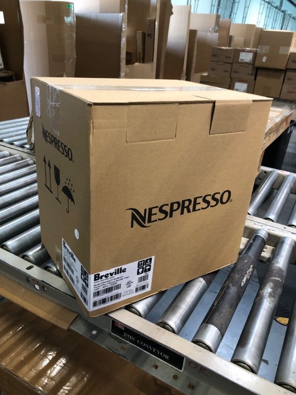 Photo 4 of "NEW FACTORY SEALED"
Nespresso VertuoPlus Deluxe Coffee and Espresso Machine by Breville with Milk Frother, Titan