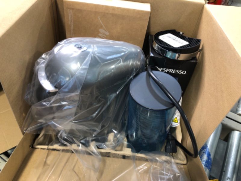 Photo 1 of "NEW FACTORY SEALED"
Nespresso VertuoPlus Deluxe Coffee and Espresso Machine by Breville with Milk Frother, Titan