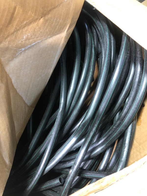 Photo 2 of ***USED*** Rain Bird T63-100 Drip Irrigation 1/2" (0.634" OD) Blank Distribution Tubing, 100' Roll, Black