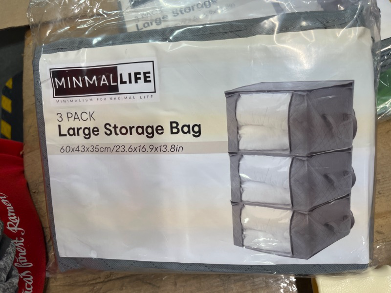 Photo 2 of ****USED****90L Large Storage Bags, 3 Pack Clothes Storage Bags, Foldable Closet Organizers Storage with Handles, Storage Containers for Organizing Bedroom, Closet, Clothing, Comforter