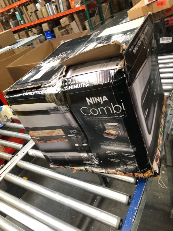 Photo 2 of ***AS IS / NO RETURNS -  FINAL SALE***parts only***
Ninja Combi All-in-One Multicooker, Oven, & Air Fryer, Complete Meals in 15 Mins, 14-in-1 Functions, Combi Cooker + Air Fry, Bake, Roast, Slow Cook and More, 3 Accessories, Stainless Steel, SFP701