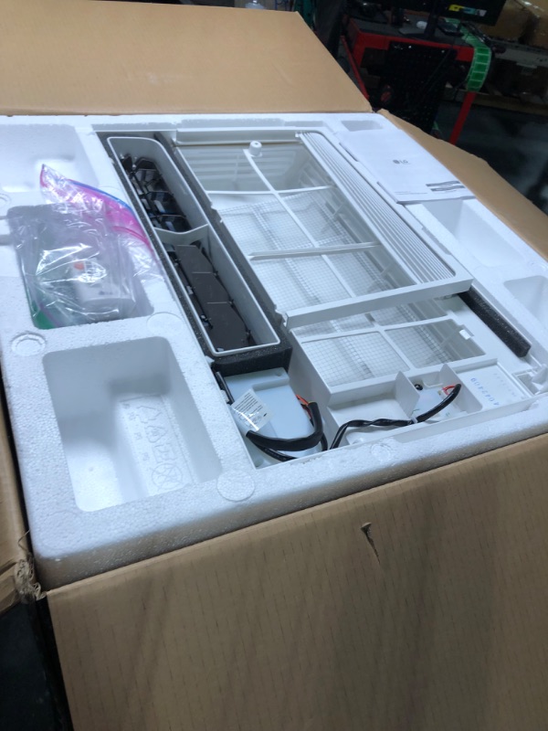 Photo 4 of ****USED***Power was on but fan doesn't move**** LG 14,000 BTU DUAL Inverter Smart Window Air Conditioner, 115V, Cools 700 Sq. Ft. for Bedroom, Living Room, Apartment, Quiet Operation, ENERGY STAR, works with LG ThinQ, Amazon Alexa and Hey Google 14000 BT