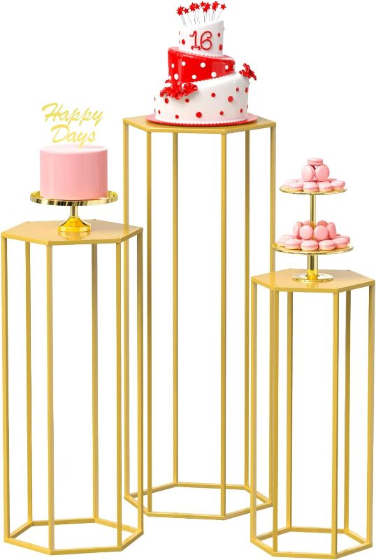Photo 1 of Wokceer Hexagon Pedestal Stand Cylinder Stands for Party 35.43" Set of 3 Nesting Display Cylinder Tables for Parties Wedding Living Room Patio Decor Gold
