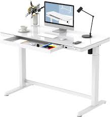 Photo 1 of electric glass standing desk 
