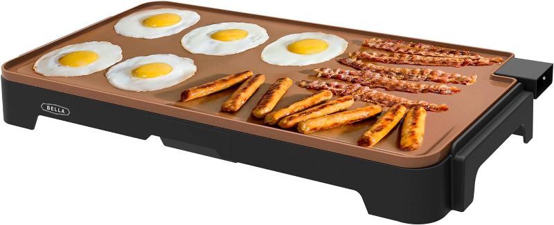 Photo 1 of BELLA XL Electric Ceramic Titanium Griddle, Make 15 Eggs At Once, Healthy-Eco Non-stick Coating, Hassle-Free Clean Up, Large Submersible Cooking Surface, 12" x 22", Copper/Black
