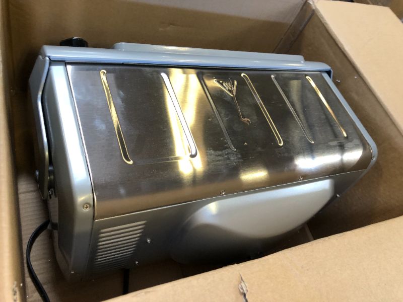 Photo 2 of Hamilton Beach 6-Slice Countertop Toaster Oven with Easy Reach Roll-Top Door, Bake Pan, Silver (31127D)