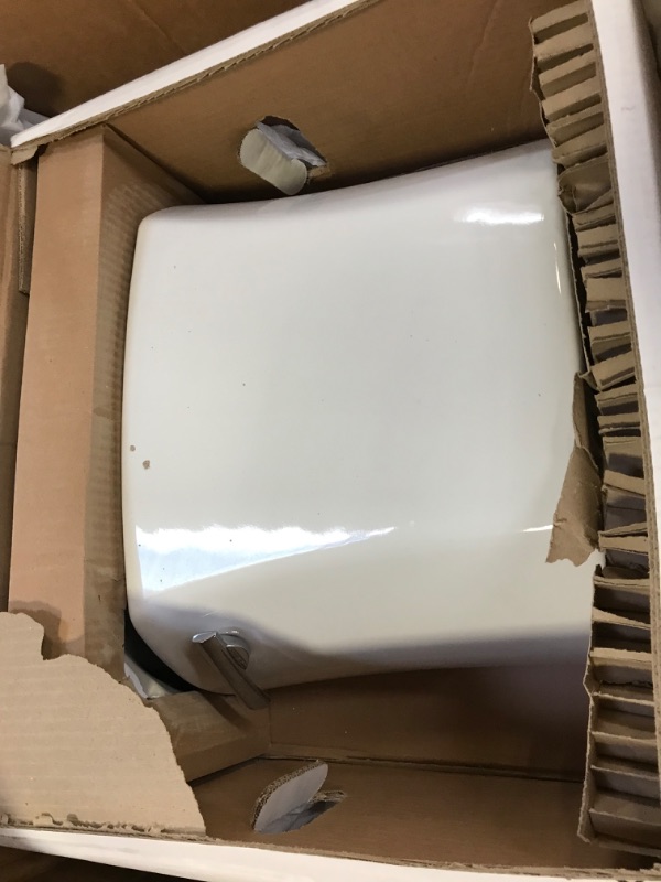 Photo 2 of parts for a Kohler 3979-0 Highline Comfort Height Two-piece elongated 1.6 gpf chair height toilet White 12 Inch Toilet