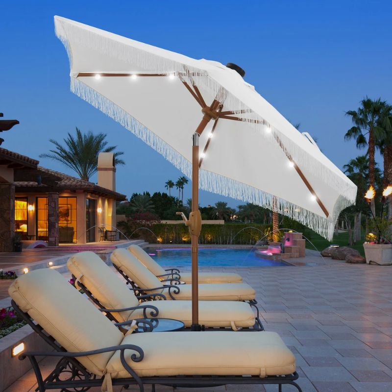 Photo 1 of Ainfox 7FT Outdoor Patio Umbrella with Tilt Fringe Tassel Umbrella with LED Solar Lights
