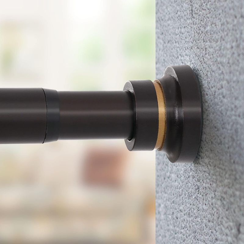 Photo 1 of H.VERSAILTEX Spring Tension Curtain Rod Adjustable 28 to 48 Inch, 1 Inche Diameter Heavy Durty Room Divider Curtain Rod No Drilling Tension Curtain Rod for Closets, Cupboard, Kitchen, Bronze
