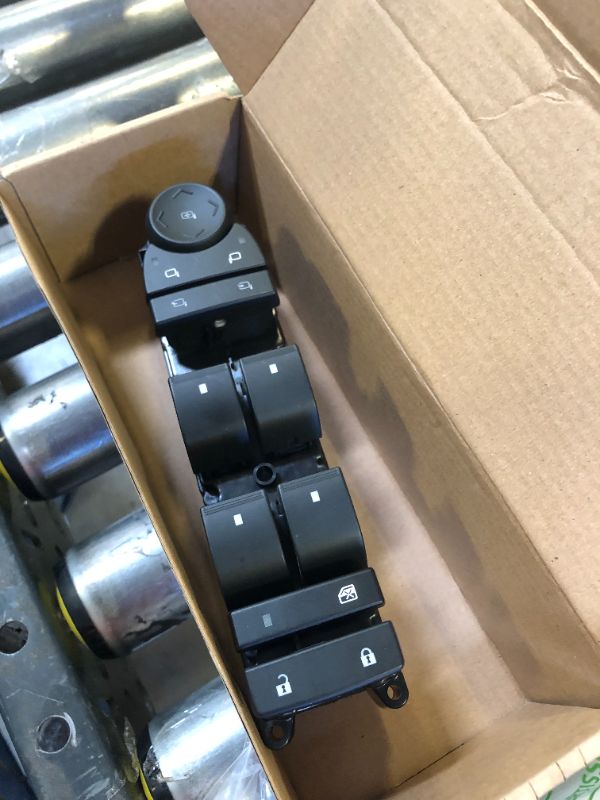 Photo 1 of DRIVER SIDE DOOR CONTROL BUTTONS FOR UNKNOWN VEHICLE