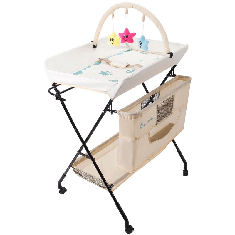 Photo 1 of Portable Baby Changing Table - Waterproof Diaper Changing Table with Wheels, Adjustable Height Folding Diaper Station with Safety Belt, Large Storage Racks for Newborn Baby and Infant
