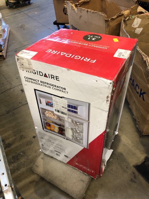 Photo 1 of Frigidaire EFR341, 3.2 cu ft 2 Door Fridge and Freezer, Platinum Series, Stainless Steel, Double & Toshiba EM925A5A-BS Microwave Oven, 0.9 Cu Ft/900W, Black Stainless Steel 3.2 cu ft Double Door Double Door Fridge 