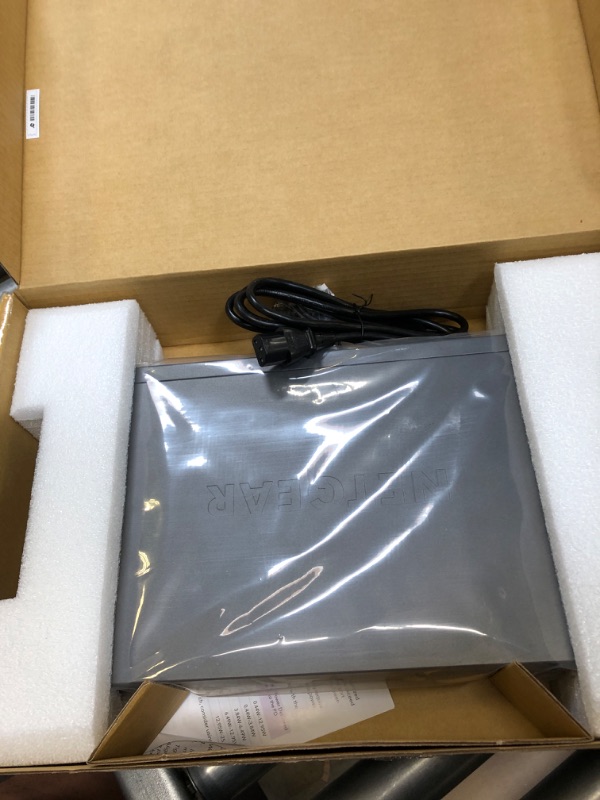 Photo 2 of NETGEAR 24-Port Gigabit Ethernet Unmanaged PoE Switch (GS524PP) - with 24 x PoE+ @ 300W, Desktop or Rackmount, and Limited Lifetime Protection 24 port | 24xPoE+ 300W