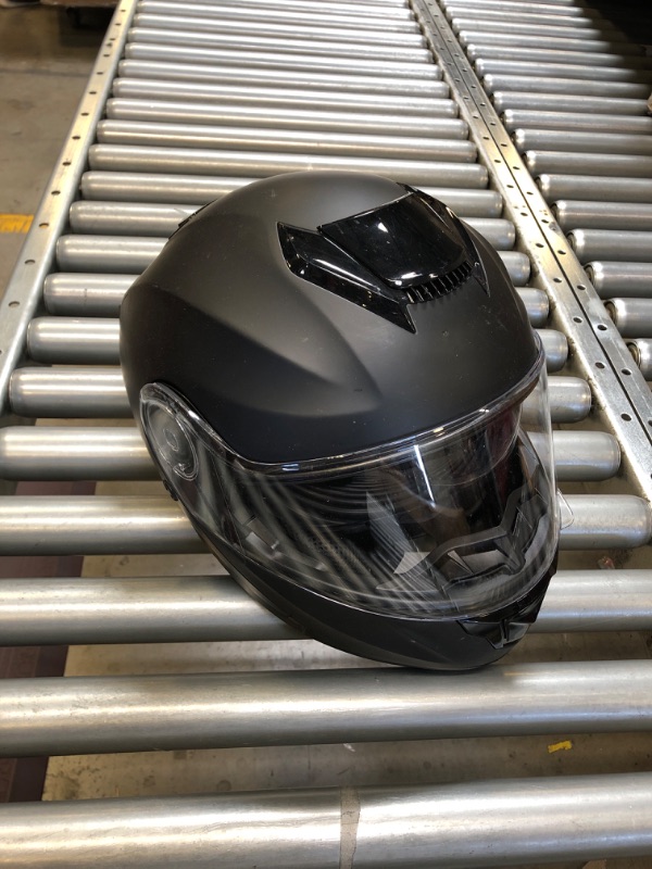 Photo 1 of MOTOR CYCLE HELMET SIZE UNKNOWN 