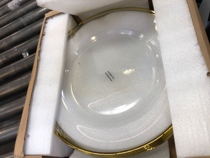 Photo 1 of clear glass plates with  metallic gold rim set of 4 