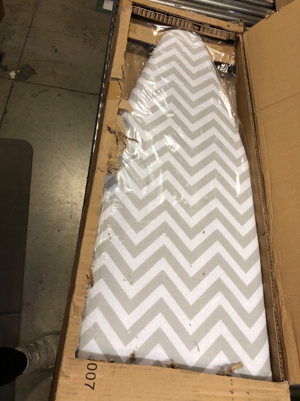 Photo 1 of Amazon Basics Full-Size Ironing Board - 4-Leg Fold-Up, Chevron Removable Cover