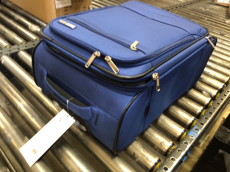 Photo 1 of blue luggage with spinner wheels 
