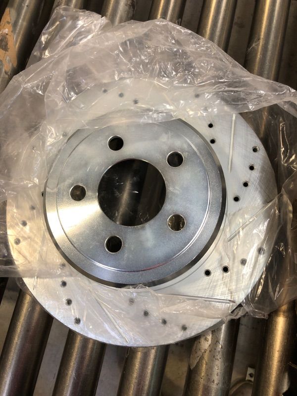 Photo 2 of Dynamic Friction 631-39018L - Drilled and Slotted Silver Zinc Brake Rotor
