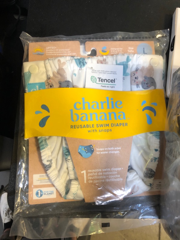Photo 2 of Charlie Banana Reusable Swim Diaper, Washable, with Easy On and Off Snaps for Baby Girls Boys, Soft and Snug Waterproof Fit to Prevent Leaks - Seally, Size L (22-34 lbs) Large Seally