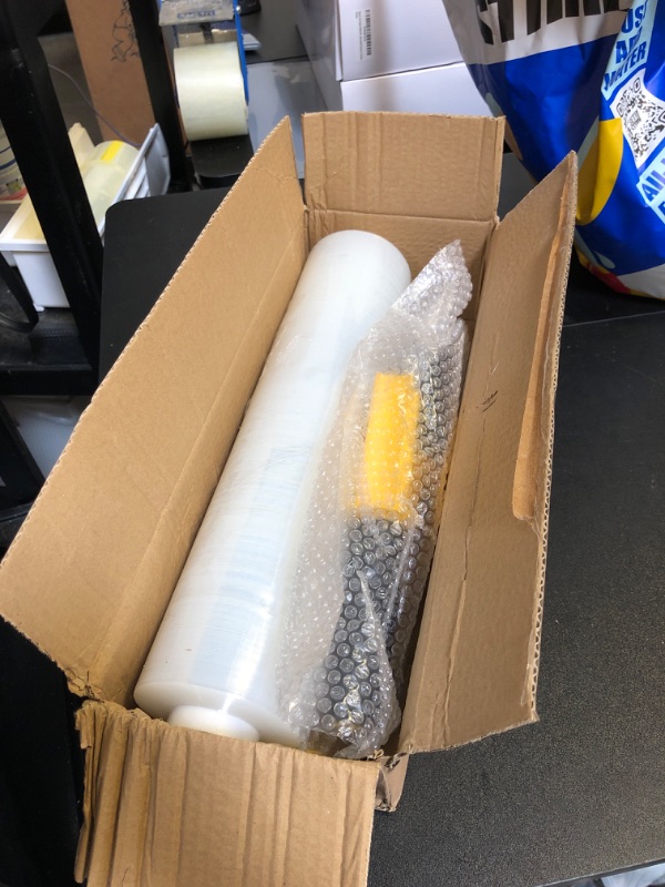 Photo 2 of Stretch Film, 500% Stretch Heavy Duty Shrink Wrap with 2 Handles, 1000ft 60 Gauge Industrial Strength 15 inch Wide Clear Plastic Wrap for Pallet Wrapping Shipping and Surface Protection