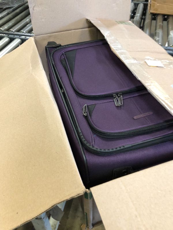 Photo 1 of 21inch purple luggage 