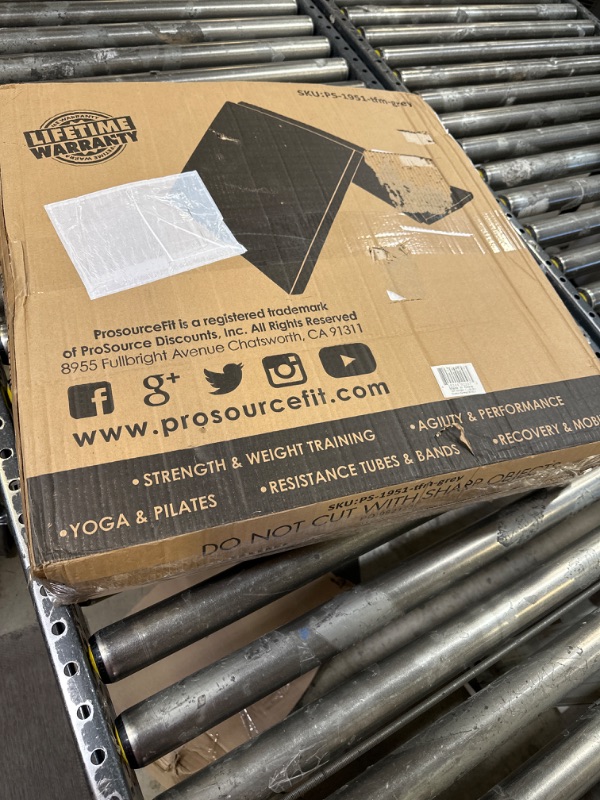 Photo 1 of ProsourceFit Tri-Fold Folding Thick Exercise Mat 6’x2’ with Carrying Handles for Tumbling, MMA, Martial Arts, Gymnastics, Stretching, Core Workouts Grey