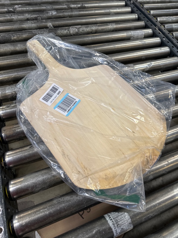 Photo 2 of New Star Foodservice 50295 Restaurant-Grade Wooden Pizza Peel, 16" L x 14" W Plate, with 10" L Wooden Handle, 24" Overall Length 14" x 16" x 24"