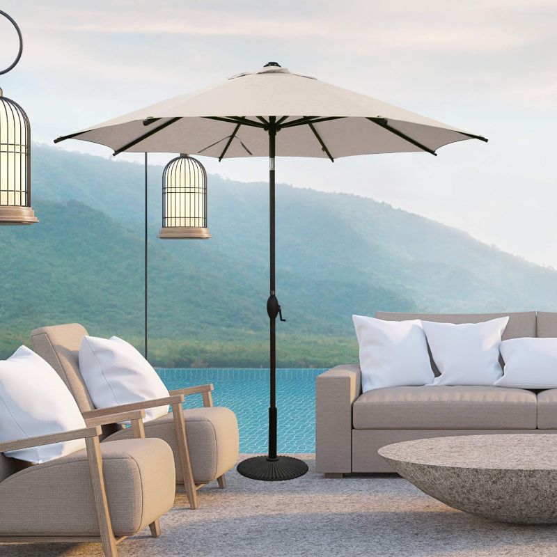 Photo 1 of Abba Patio Patio Umbrella Market Outdoor Table Umbrella with Auto Tilt and Crank for Garden, Lawn, Deck, Backyard & Pool, 8 Sturdy Steel Ribs,
- base not included