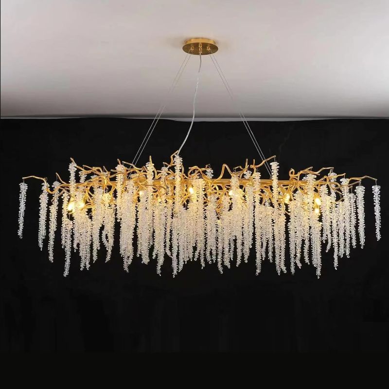 Photo 1 of Puvaue Crystal Tree Branch Chandelier L63 Inch Luxury Rectangular Crystal Raindrop Pendant Light 16 Lights Kitchen Island Hanging Light Fixture for Living Room Dining Room Foyer Entryway Gold
