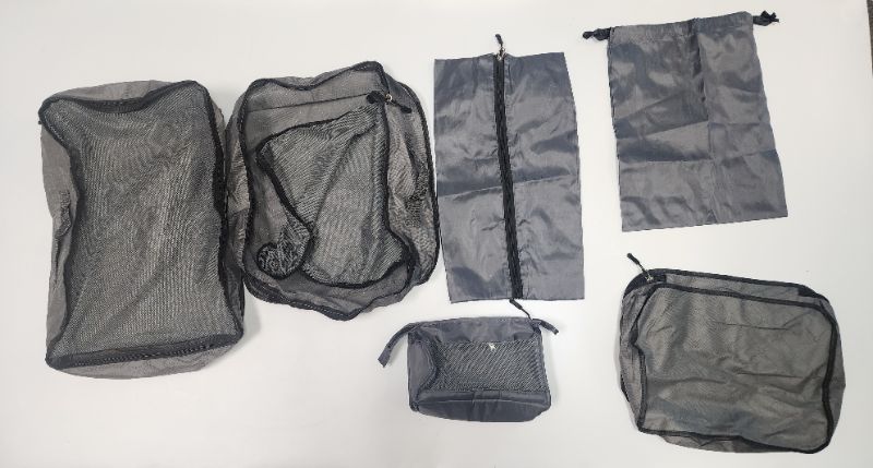 Photo 1 of ALPAKA Packing Cube Collection - Small, Medium, and Large Packing Cubes for Travel - Black Weatherproof Fabric Protects Clothes, Shoes, and Gear
