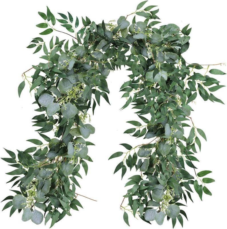 Photo 1 of Fake Greenery Garlands Artificial Silver Dollar Eucalyptus Garland in Grey Green and Willow Twigs Garland Intertwined Together for Rustic Wedding Arch Swag Doorways Table Runner Decoration
