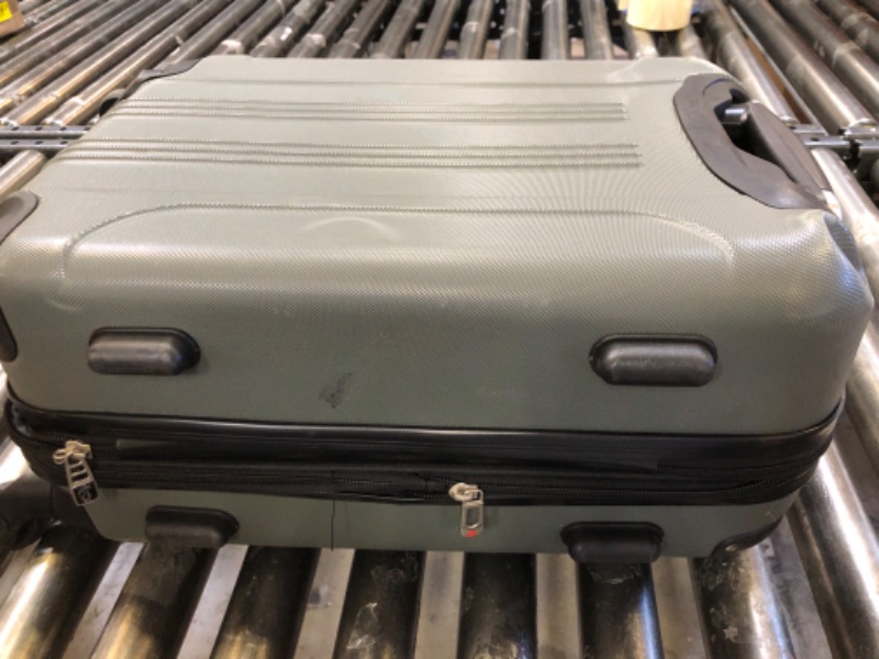Photo 1 of Dark green 20in suitcase