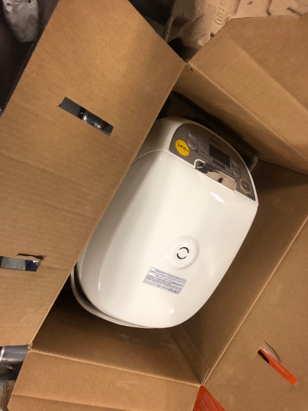 Photo 1 of Micom 5.5-Cup White Rice Cooker with Tacook Cooking Plate