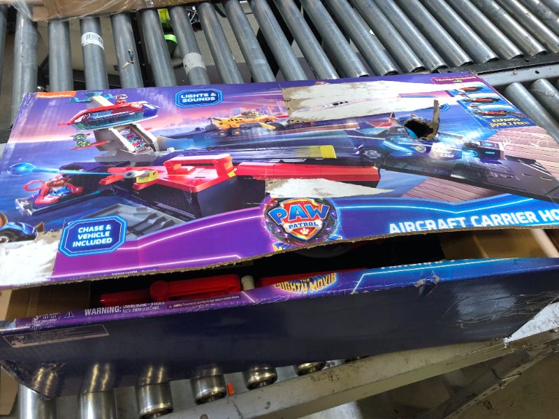Photo 1 of Paw Patrol: The Mighty Movie, Aircraft Carrier HQ, with Chase Action Figure and Mighty Pups Cruiser, Kids Toys for Boys & Girls 3+