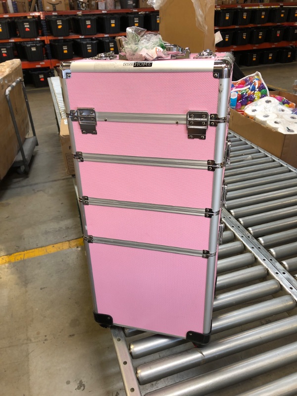Photo 1 of PINK VANITY CASE WHEELS ARE MISSING  AND HAS DENTS ALL AROUND 