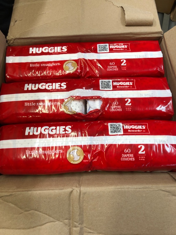 Photo 2 of Huggies Size 2 Diapers, Little Snugglers Baby Diapers, Size 2 (12-18 lbs), 180 Ct (3 packs of 60), Packaging May Vary Size 2 180