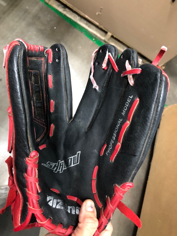 Photo 2 of **thread that keeps glove tofether needs to be repaired**
Mizuno Shadow Series 13" Professional Model Softball Glove
