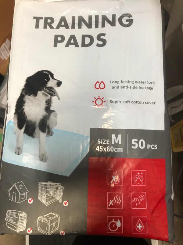 Photo 1 of  pet training pads 50 ct size medium